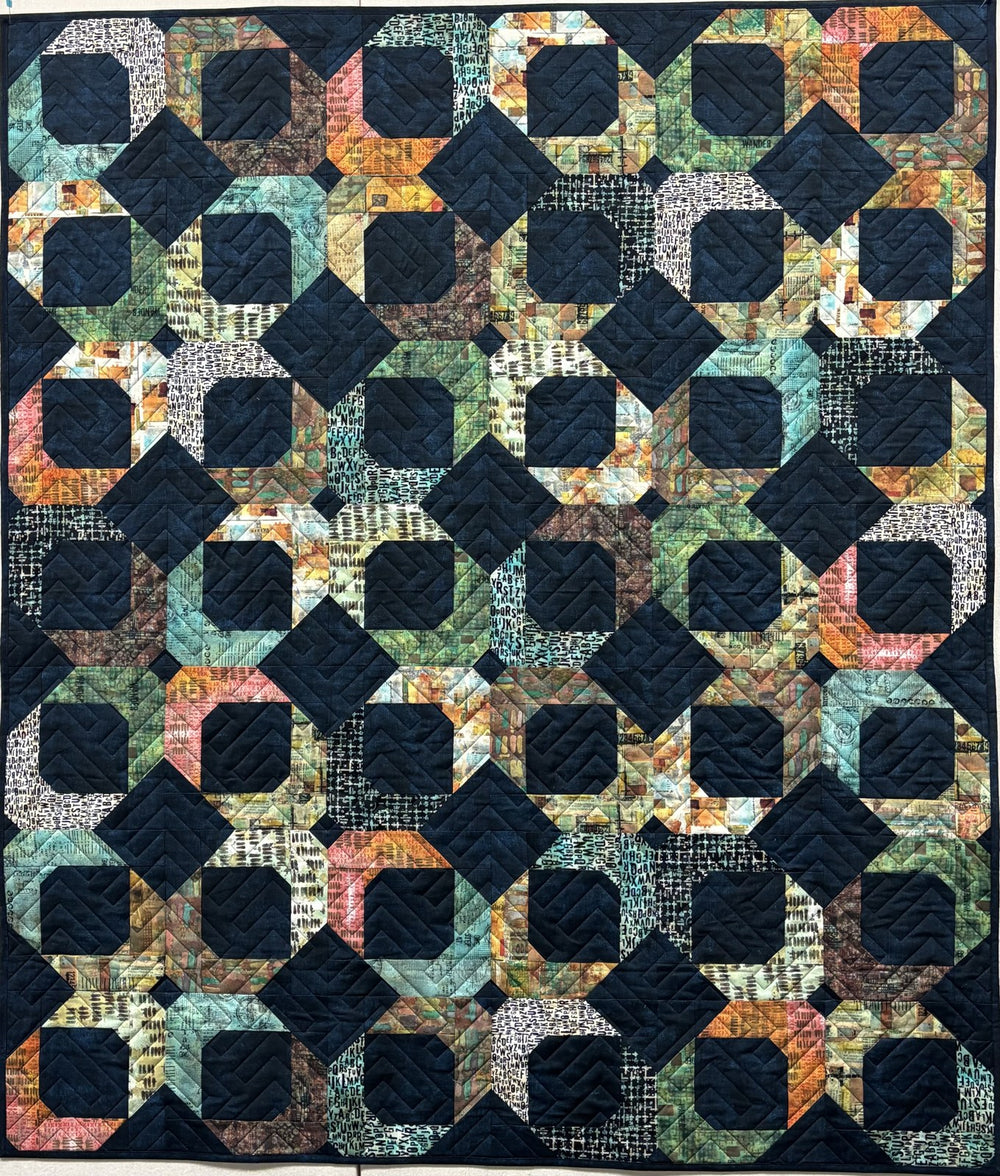 Quadrants quilt, part of the Stripology Squared Trunk trunk show