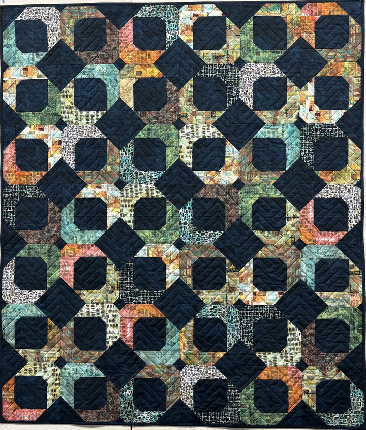 Quadrants quilt, part of the Stripology Squared Trunk trunk show